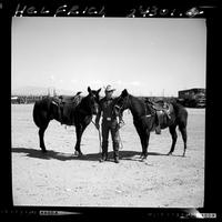 Walt Linderman with 2 horses