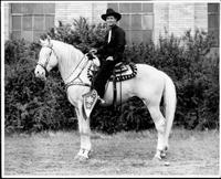 Johnniw Lee Wills on horseback