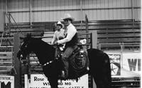 Unidentified cowboys on horseback