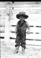 [Unidentified male child in western boots and hat]