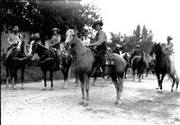 [Unidentified cowgirl atop horse]