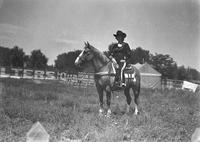 [Unidentified cowgirl on horse]