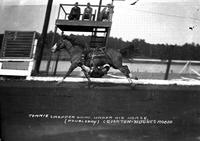 Tommie Cropper Going Under His Horse Compton-Hughes Rodeo