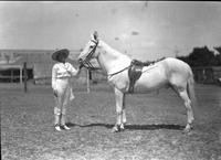 [Mamie Francis standing beside Christmas]