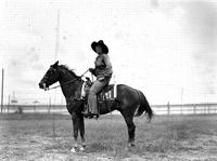 [Possibly Grace White on horseback in profile]