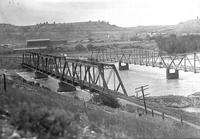 [Two bridges, one railroad the other pedestrian]