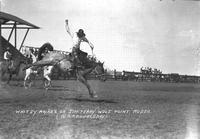 Whitey Raines on "Jim Terry" Wolf Point Rodeo