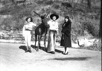 [Cowgirl, elk, possibly Shorty Sutton, and lady]