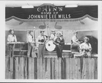 Johnnie Lee Wills and band [the band is posing on stage at Cain's]