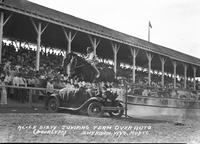 Alice Sisty Jumping Team Over Auto Sheridan, Wyo. Rodeo