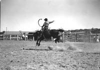 [Unidentified Cowboy riding bronc]