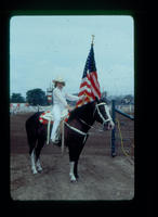 Unidentified Cowgirl, Flag bearer