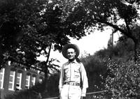 [Unidentified Cowboy (perhaps Morrison) wearing "Champion Bull Rider Largo Florida" buckle]