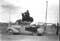 Alice Sisty in her Famous Roman Jump over auto