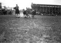 Frank McCarroll Bulldogging Burwell, Rodeo Time 5 sec.