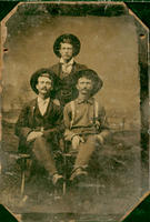 Three dressed up western men