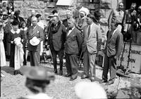 [Relatives of Will Rogers in line at dedication of the Shrine of the Sun with singing cowboys]