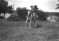 [Possibly Earl Strauss riding horse]