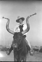 [Possibly Mamie Francis posed atop Bobby the Steer]