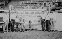 Unidentified group of Cowboys & children