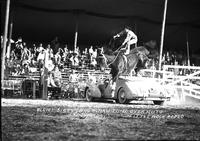 Alice Sisty doing Roman Jump over auto Little Rock Rodeo