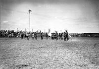 [Group of Indian dancers in arena]