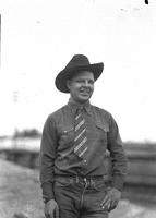 [Eddie Curtis wearing cowboy hat and necktie]