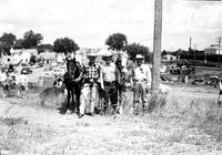 [Wild Bill Elliott with Leo Cremer and unidentified cowboy and two horses]