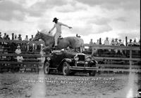 Louis Tindall Jumping Horse Over Auto 11th Annual Rodeo, Del Rio, Tex
