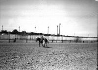 [Unidentified Cowgirl doing Russian Drag in the Saddle]