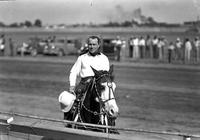 [Possibly Jack Nichols hat in hand at side on horseback; Silver ferules on bridle & breast collar]