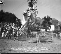 Raymond Ramsey Riding Roman Over Hurdle, Ft. Smith Rodeo