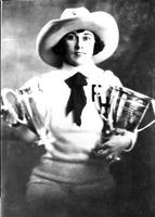 [Florence Hughes Randolph holding trophies in studio pose]