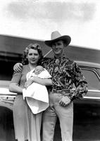 [Junior Eskew with his wife, Mary, and baby daughter, Madonna]