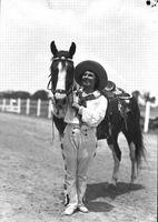 [Florence Hughes Randolph posed by horse]