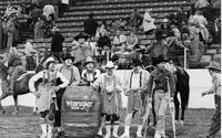 Unidentified group of Rodeo clowns and others