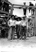 [Possibly Lynn Beutler, Sally Rand, and Eddie Curtis posed in front of chutes]