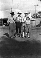 [Joe Greer, Greer's son and daughter, and Gene Autry, Aquatennial Rodeo Minneapolis, Minn.]