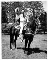 Johnnie Lee Wills [on horseback]