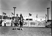 [Possibly Tennessee Ernie Ford & an unidentified cowboy posed on horseback]