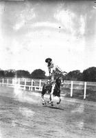 [Possibly Florence Randolph doing one-foot slick saddle stand]