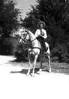 [Unidentified Cowgirl on horse]