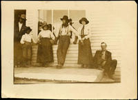 Blackfeet and Anglos standing on the boardwalk, Browning, Montana