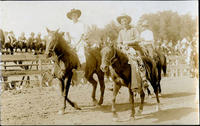 Three unidentified cowboy on horses