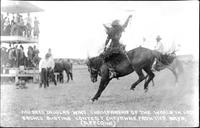 Mildred Douglas wins championship of the world in lady bronco busting contest, Cheyenne Frontier Day