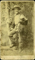 Possibly an older blacksmith with perhaps a leather apron flung over his shoulder