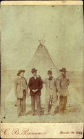 Three Men in fringed buckskin coats and one in a linen coat