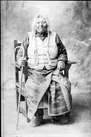 Portrait of unidentified Native American woman with cane