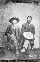 Two cowboys with large hats