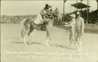 Mable [sic] Strickland presented with flowers by Round Up Queen, Round Up - 1922